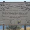 After crossing the Lake Koocanusa Bridge, the first sign you see on the way to the West Kootenai ~ the location of the Bullet Hole Cabin.